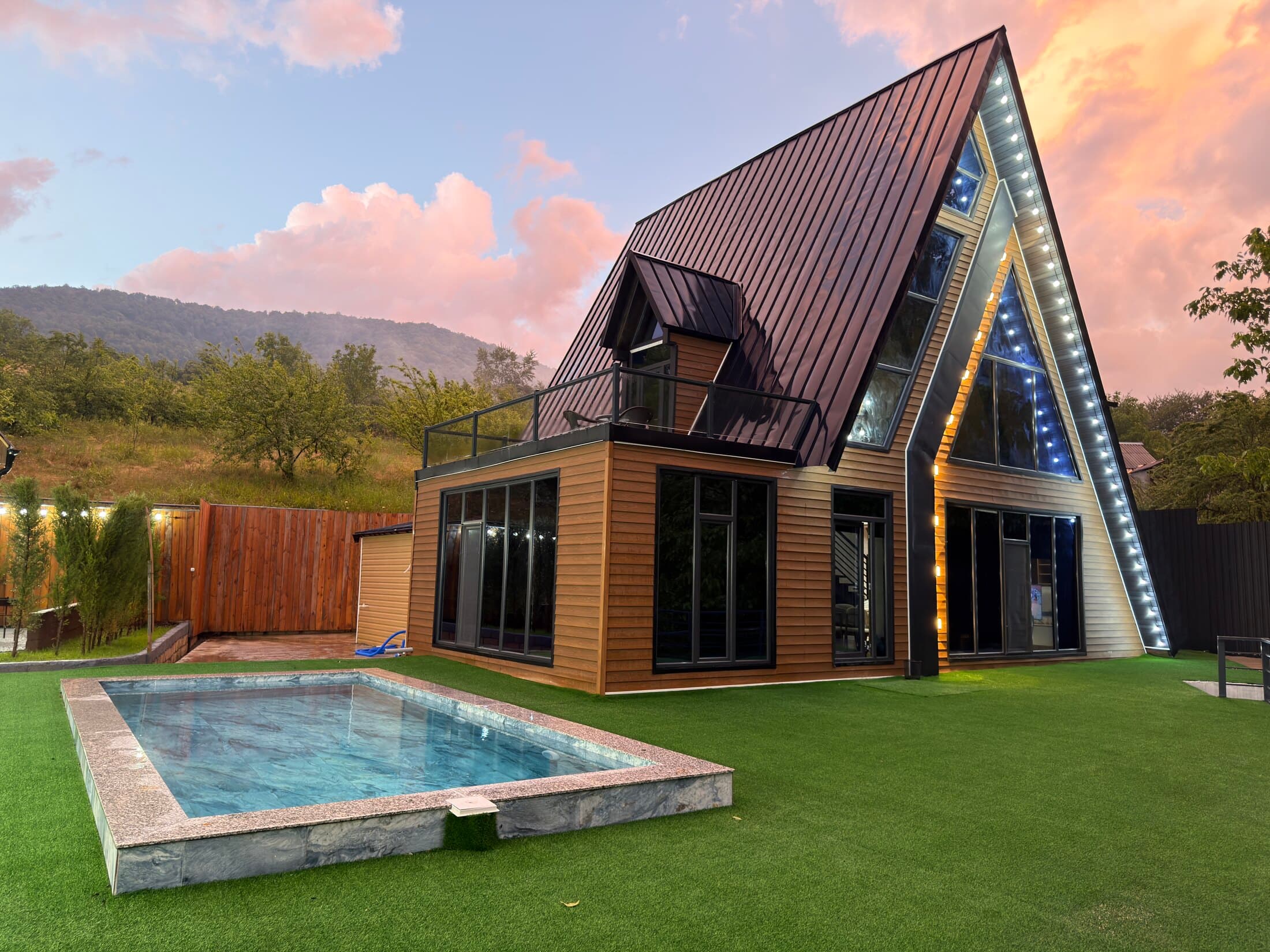 Pool and A-frame at dusk